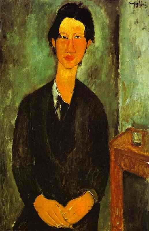 portrait of chaim soutine seated at a table.jpg